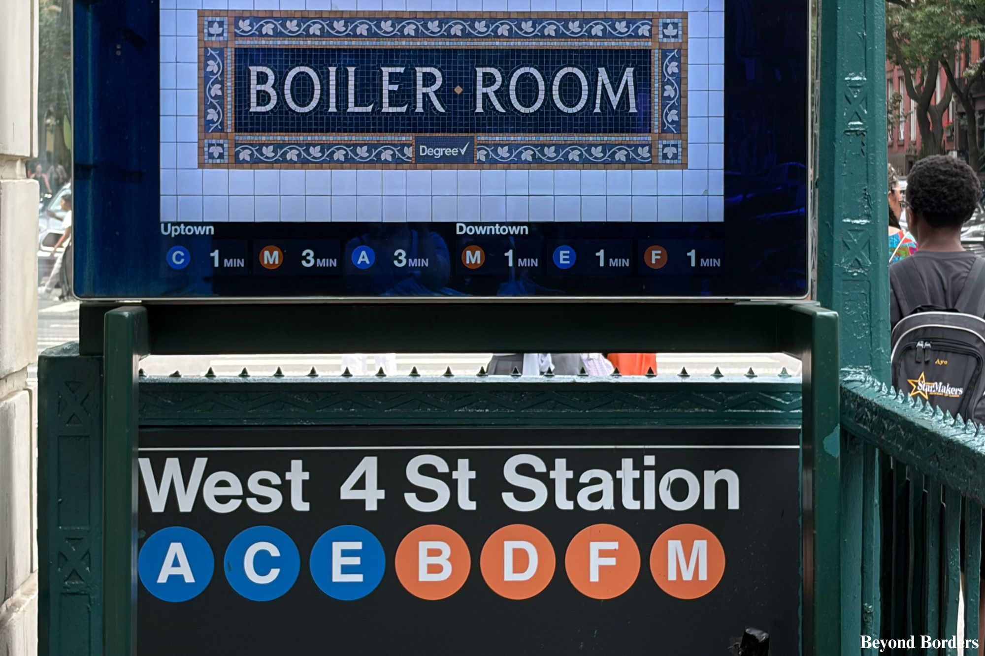 A subway entrance for the West 4th St station in Manhattan, NYC