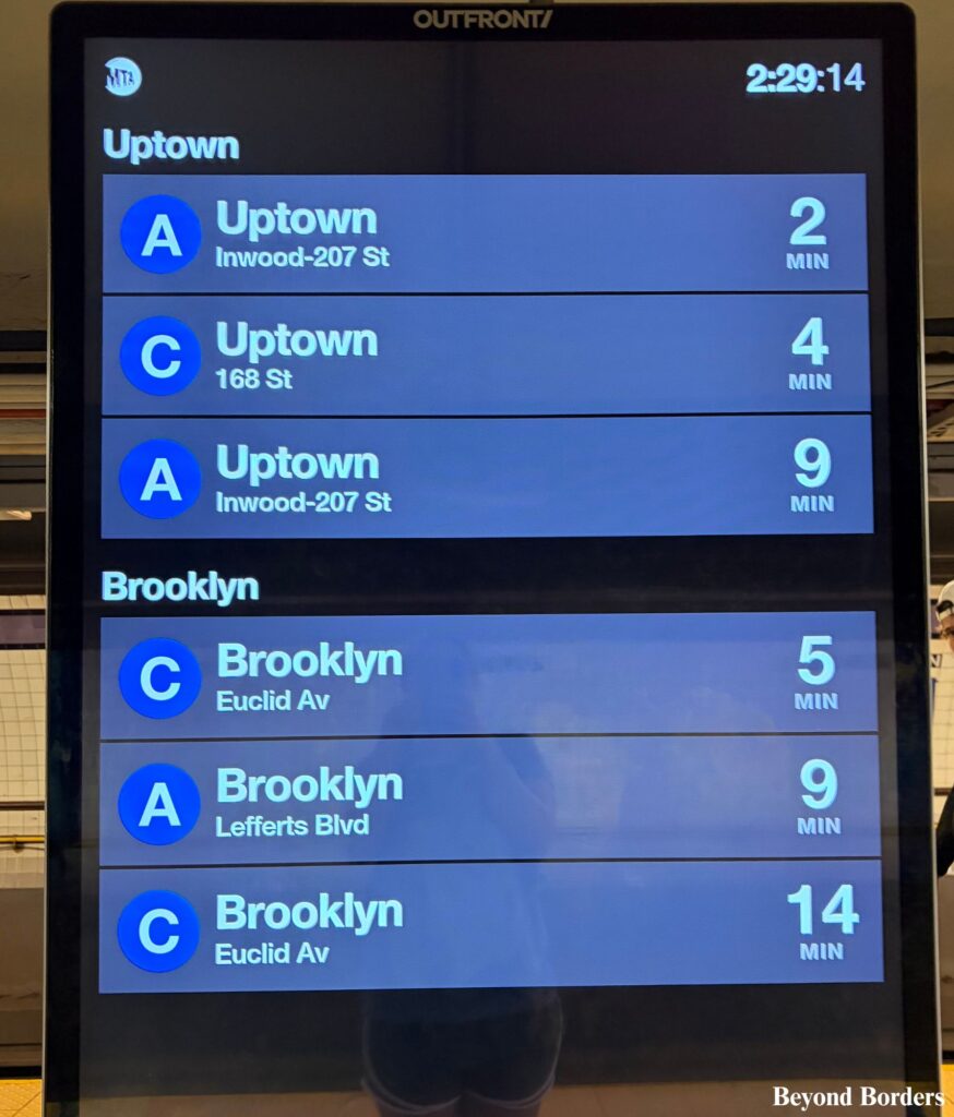 Subway sign on the platform at Fulton St station in downtown Manhattan, NYC