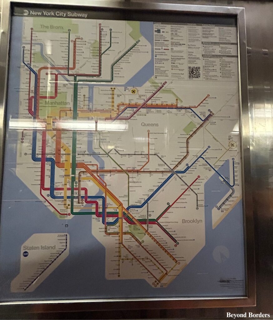 NYC subway system map in a subway car