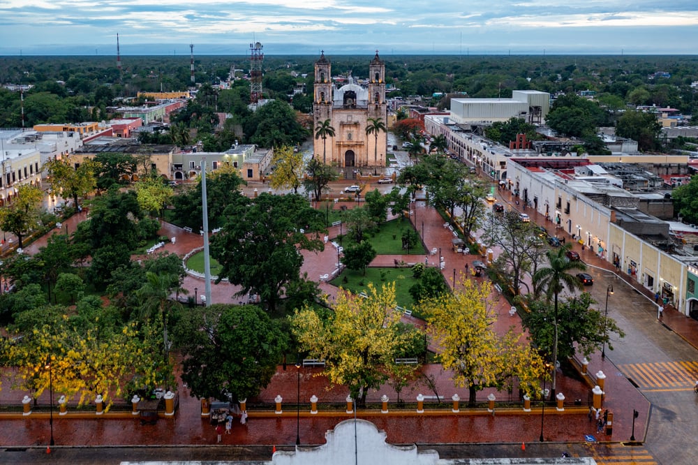 Valladolid is the colorful heart of the Yucatan. Walk down the famous Calzada de los Frailes, swim in Cenote Zaci (located right in the city!), and enjoy the best traditional cochinita pibil. A must-stop on any 2026 Mexico itinerary. #ValladolidMexico #VisitYucatan #CenoteLife
