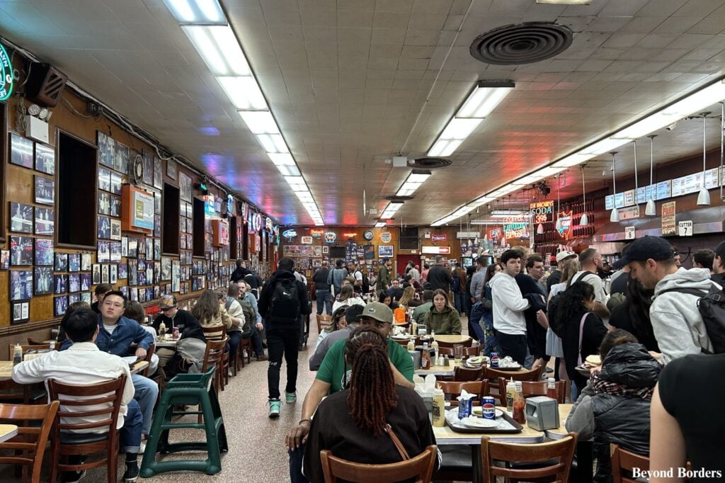 Self-service seating across from the lines for cutters at Katz's Deli