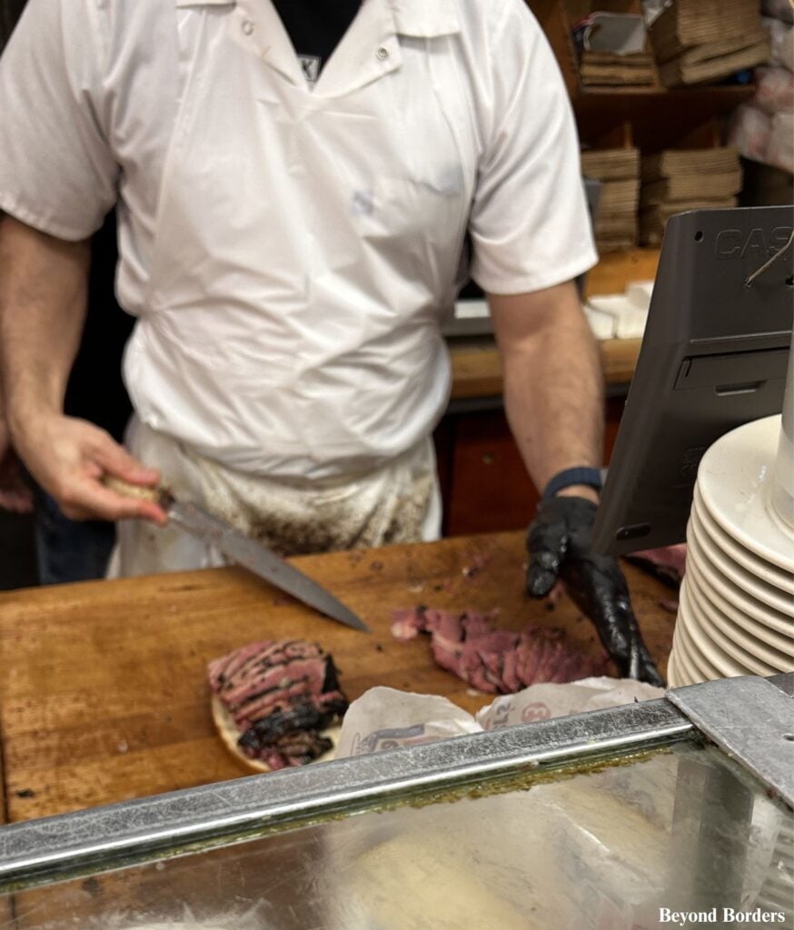 Katz's Deli cutter making my pastrami on rye sandwich