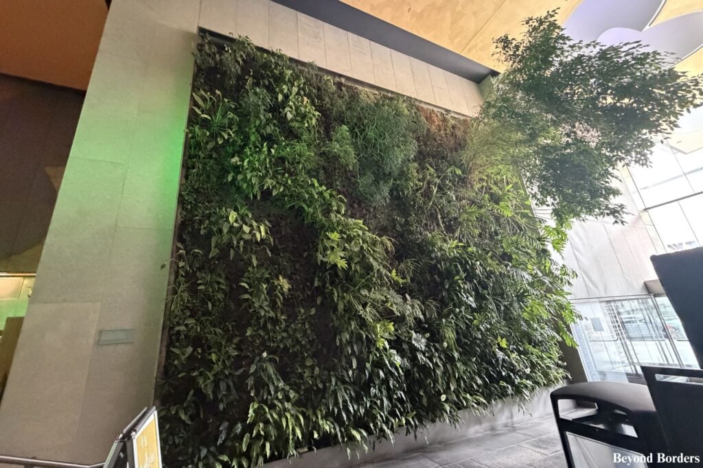 One of the large vertical green plant walls visible right from the Broadway sidewalk of the David Rubenstein atrium in NYC.