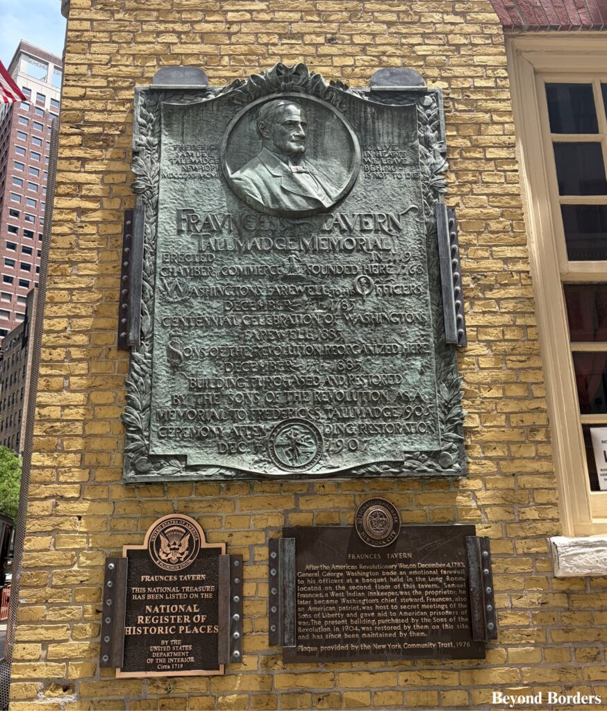 Plaques outside of Fraunces Tavern on Pearl Street, the oldest and most historic bar in Manhattan and listed on the US National Register of Historic Places; Stone Street NYC