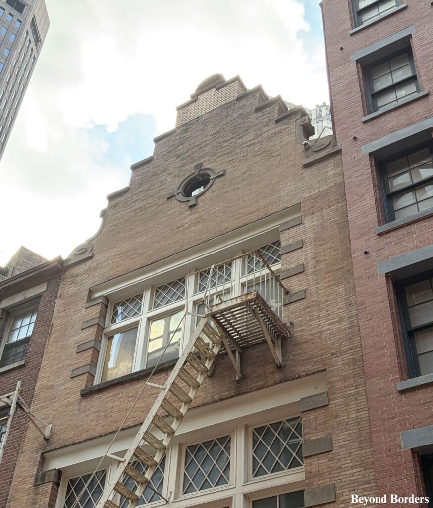 Stepped gable roof at 57 Stone Street in Manhattan, NYC that was built in the early 1900s during a wave of Dutch nostalgia to mimic the lost 17th-century houses.