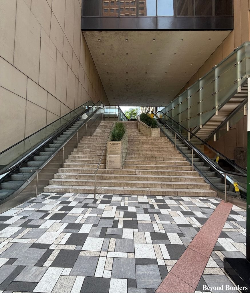 Escalators and stairs to access Elevated Acre in Lower Manhattan, NYC
