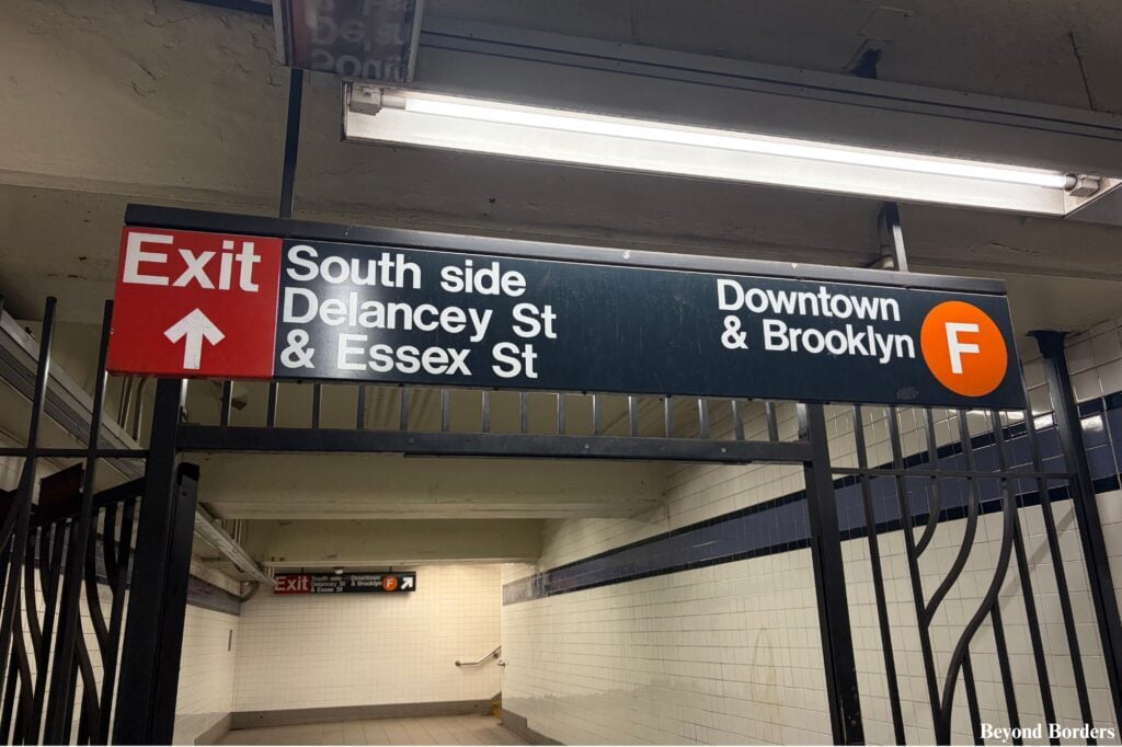 Look for the South side Delancey St and Essex St stairs to arrive right next to Essex Market in NYC