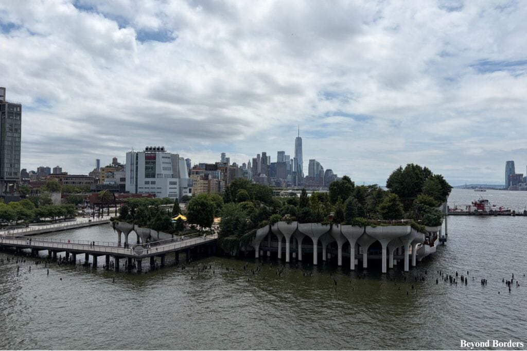 The Whitney Museum of American Art, Little Island, and One World Trade Center seen from the rooftop at Pier 57 in NYC