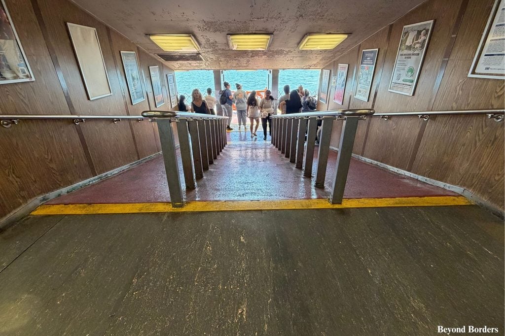 Go down this ramp at the back of the Staten Island Ferry to take unobstructed photos of the Statue of Liberty and Lower Manhattan