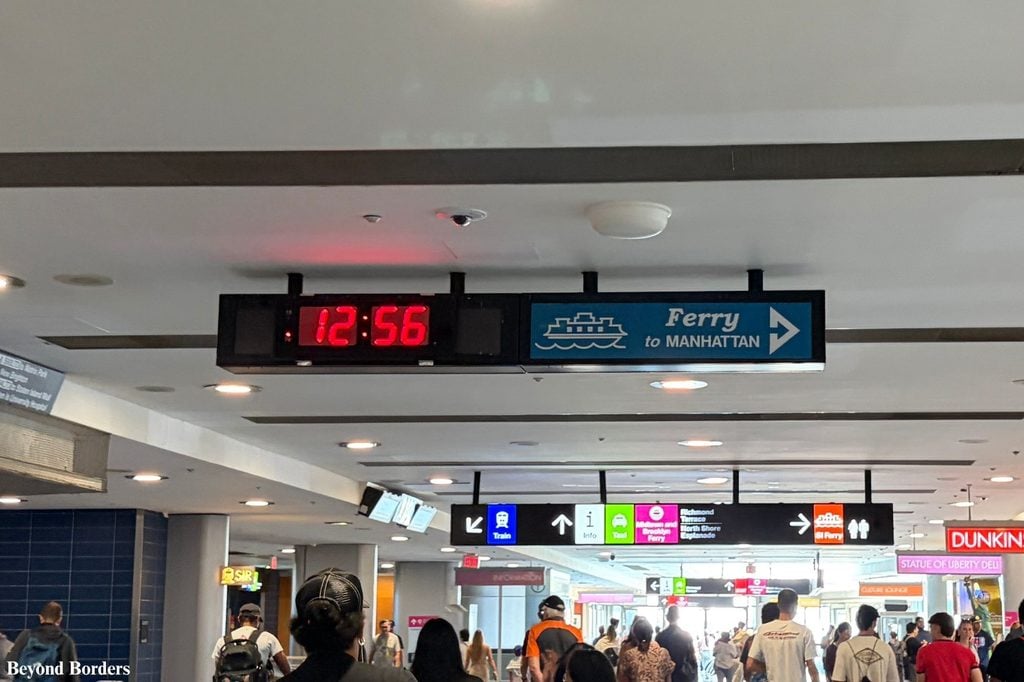 Sign at St. George's terminal in Staten Island to get back to Manhattan on the Staten Island Ferry