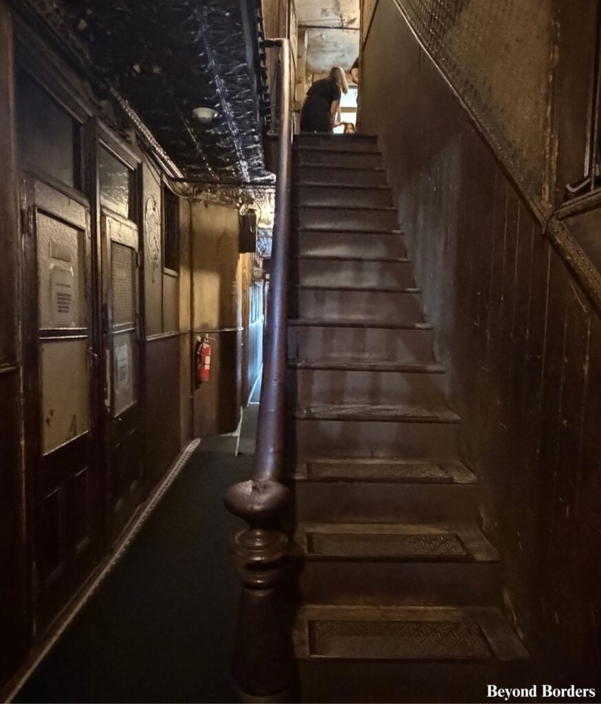 Staircase at Tenement Museum in NYC at 97 Orchard St after entering the building