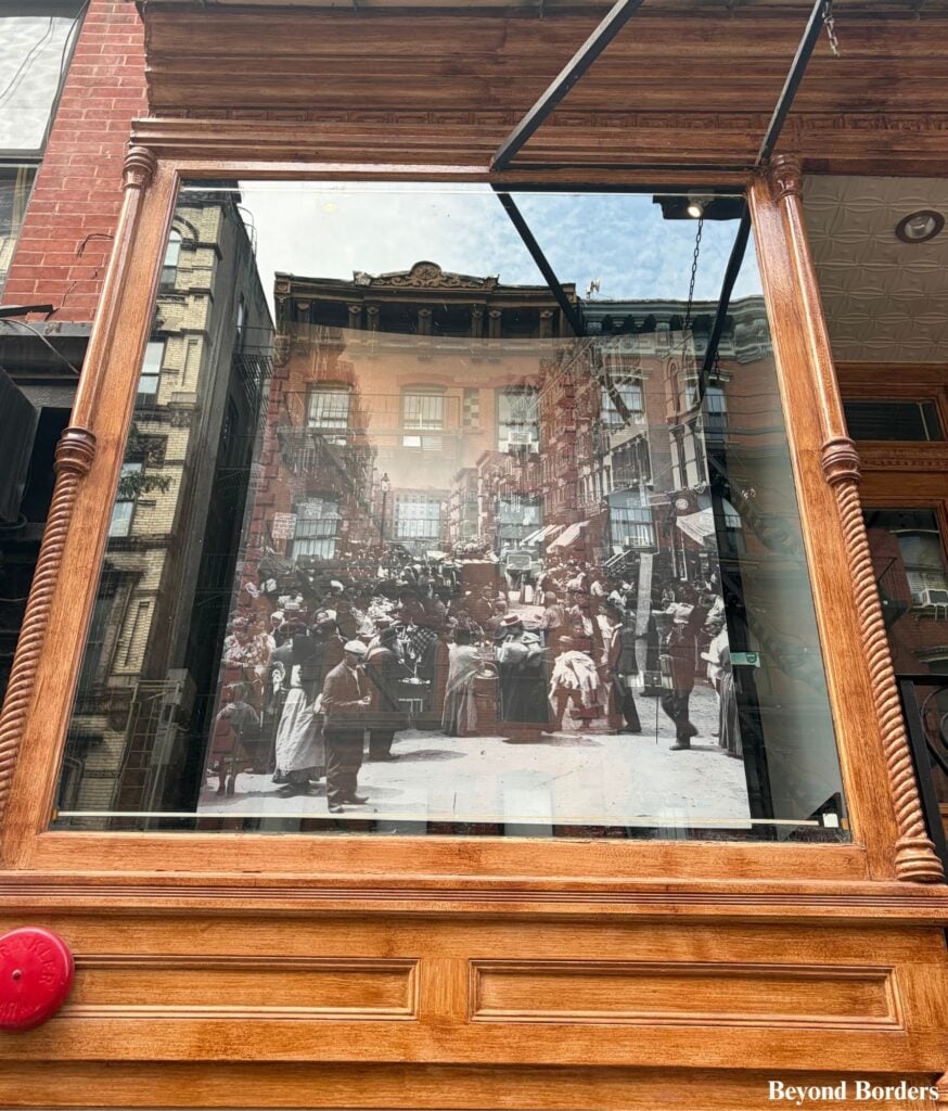 This photo of Orchard St in the 19th century is at 97 Orchard St Tenement Museum in NYC