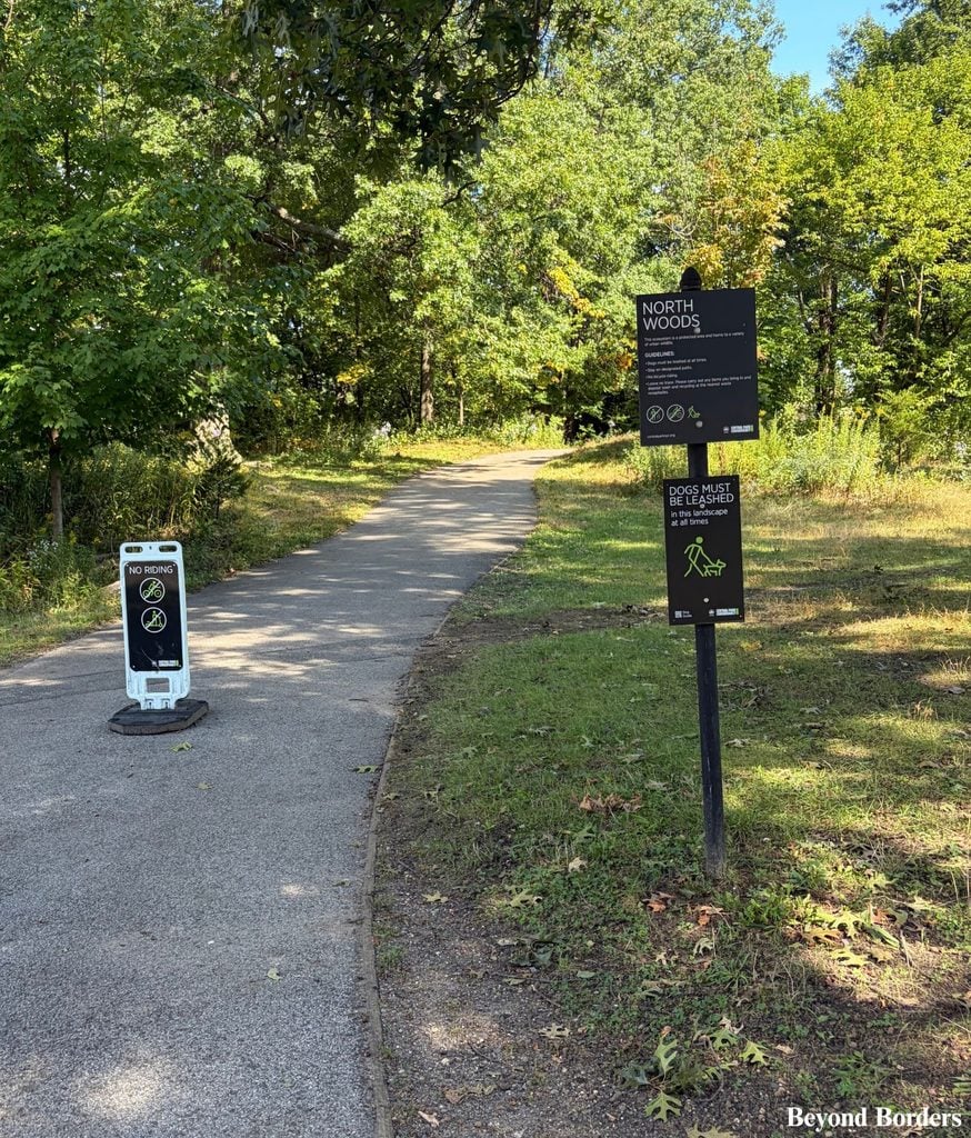 Entrance to Central Park's North Woods at the 102nd St crossing in Manhattan, NYC; quiet spots in Central Park