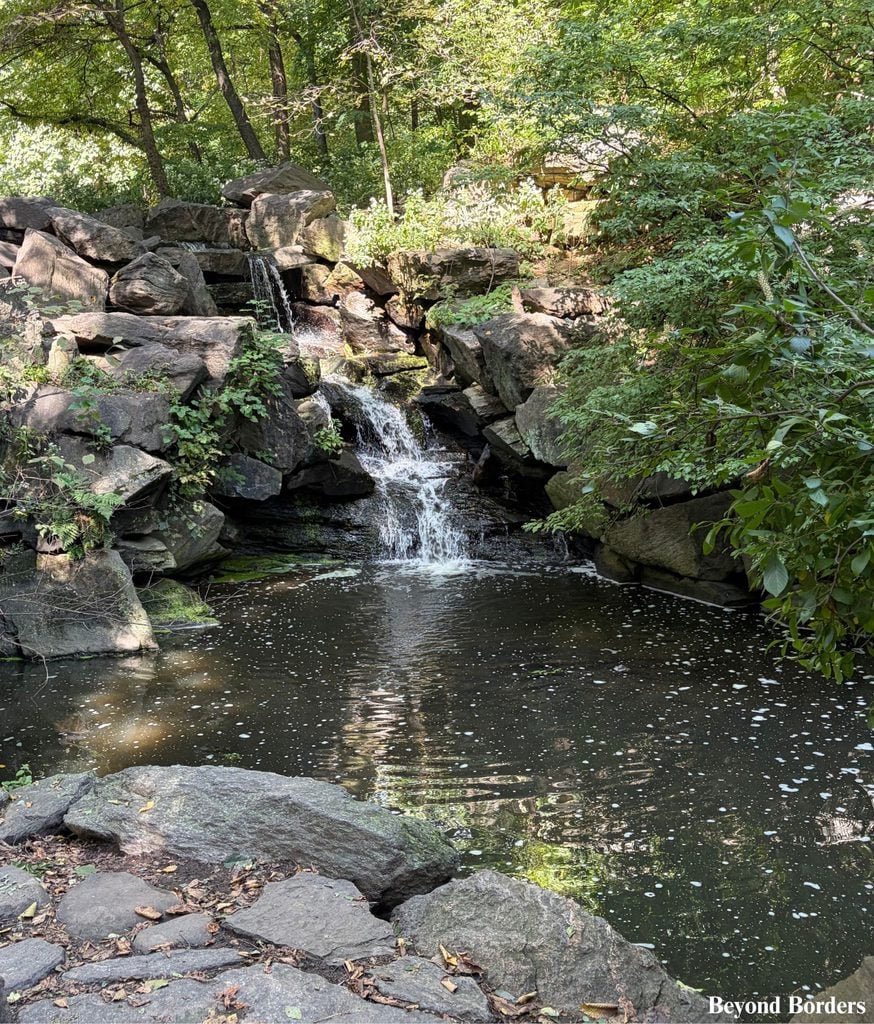 Waterfall at the western end of The Loch near the Glen Span Arch and The Pool in North Woods, Central Park, Manhattan, NYC; quiet spots in Central Park